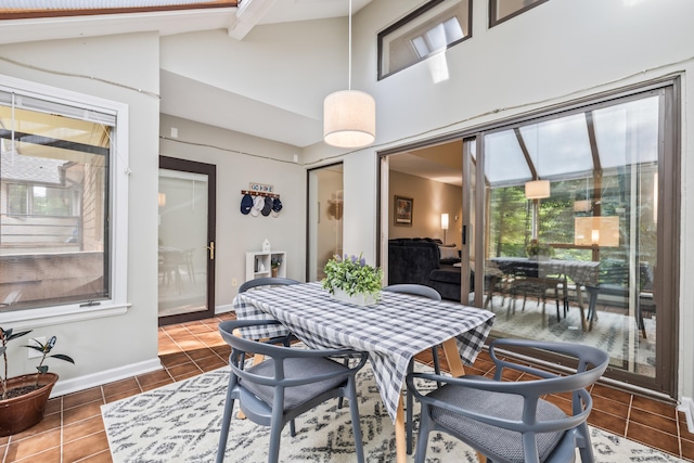 17 Font Hill Park Unit 17, Bloomfield, CT 06002 - dining space with tile patterned floors, beamed ceiling, and high vaulted ceiling