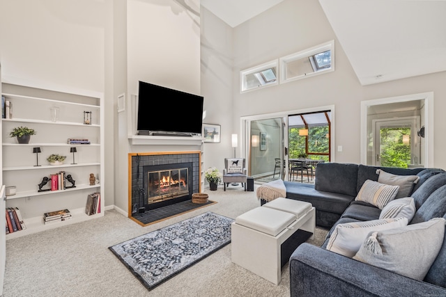 17 Font Hill Park Unit 17, Bloomfield, CT 06002 - carpeted living area with a towering ceiling, a tile fireplace, and built in features