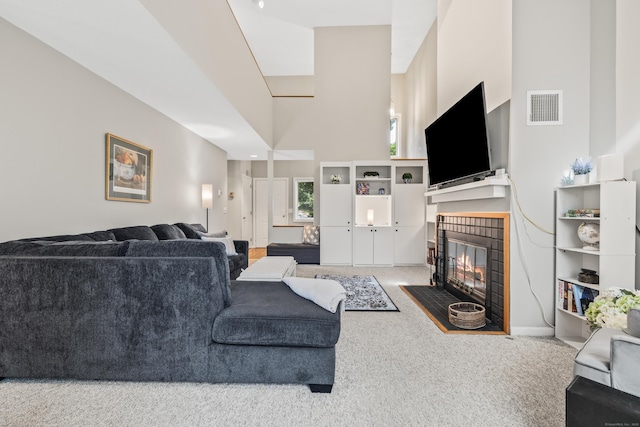 17 Font Hill Park Unit 17, Bloomfield, CT 06002 - living room featuring a tile fireplace and carpet floors