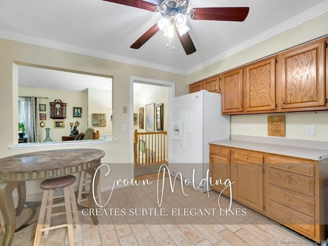 7 Sylvan Rd, Danbury, CT 06811 - kitchen featuring white fridge with ice dispenser, a ceiling fan, light countertops, ornamental molding, and brown cabinets