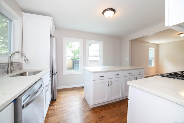 30 Ward Pl, West Haven, CT 06516 - kitchen featuring dishwashing machine, dark wood finished floors, white cabinetry, and light stone counters