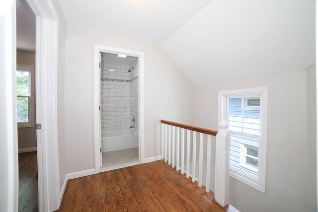 30 Ward Pl, West Haven, CT 06516 - corridor featuring an upstairs landing, dark wood-style flooring, and vaulted ceiling