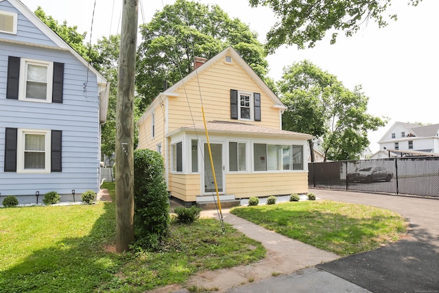 30 Ward Pl, West Haven, CT 06516 - view of front facade with entry steps and a chimney