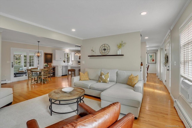 15 Thompson Hill Rd, Canton, CT 06019 - living room featuring a baseboard radiator, light wood finished floors, ornamental molding, recessed lighting, and a baseboard heating unit
