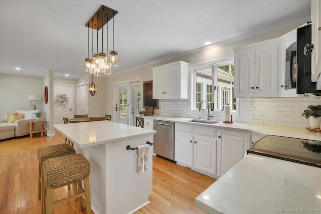 15 Thompson Hill Rd, Canton, CT 06019 - kitchen with black appliances, a center island, backsplash, white cabinetry, and crown molding