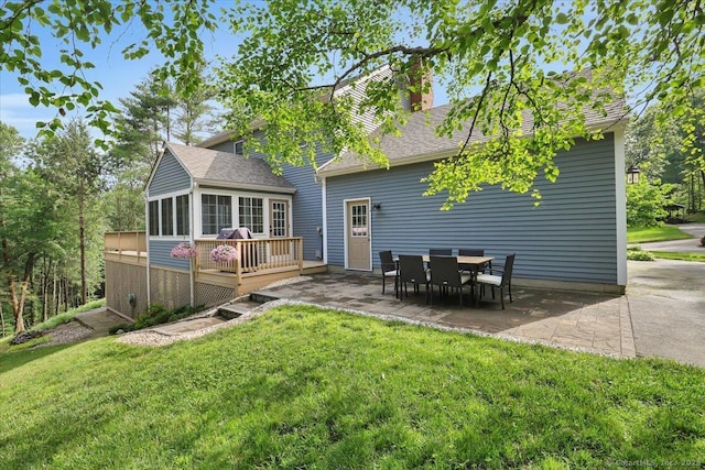 15 Thompson Hill Rd, Canton, CT 06019 - back of property featuring a patio area, a deck, a lawn, and a sunroom