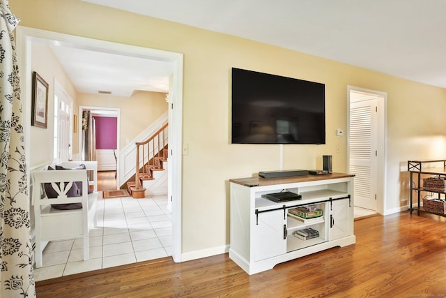 58 Inca Dr, Trumbull, CT 06611 - living room featuring light wood-style flooring and stairway