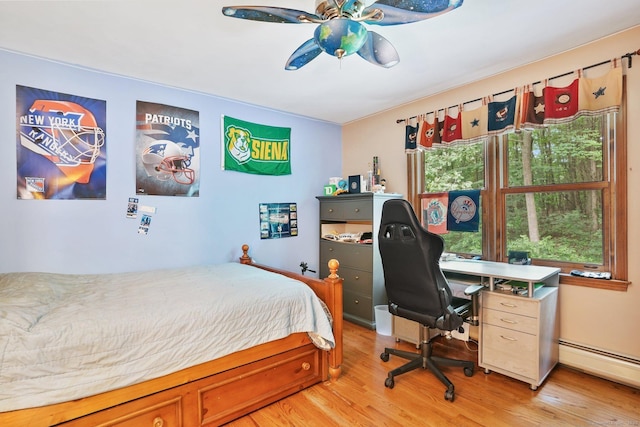58 Inca Dr, Trumbull, CT 06611 - bedroom featuring a baseboard radiator, light wood-style flooring, a desk, and a ceiling fan