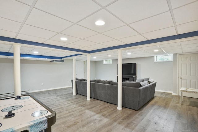 58 Inca Dr, Trumbull, CT 06611 - living area featuring wood finished floors, a baseboard heating unit, a drop ceiling, and recessed lighting