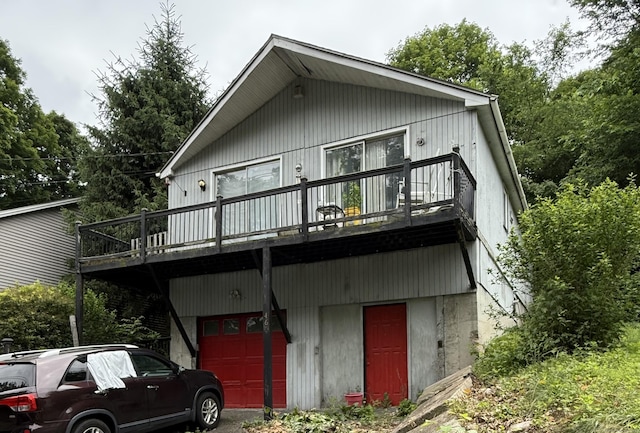 466 Waterville St, Waterbury, CT 06710 - rear view of property featuring an attached garage and a deck