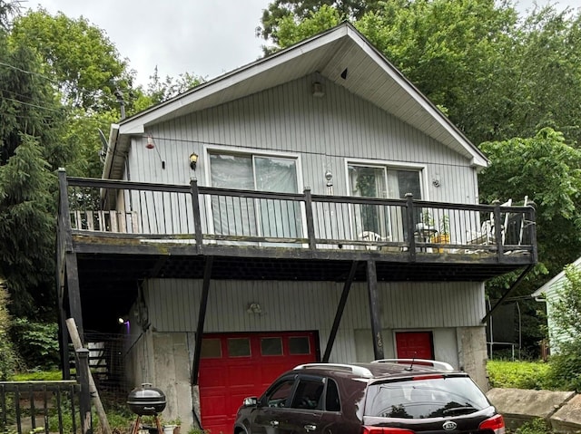 466 Waterville St, Waterbury, CT 06710 - view of front of home featuring a deck, a garage, and stairway
