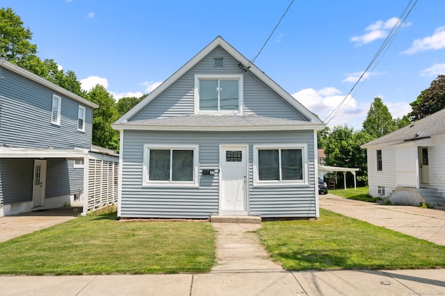 89 Geer Ave, Norwich, CT 06360 - view of front of house with a front yard, entry steps, and roof with shingles
