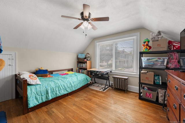 89 Geer Ave, Norwich, CT 06360 - bedroom featuring hardwood / wood-style floors, a textured ceiling, lofted ceiling, and ceiling fan