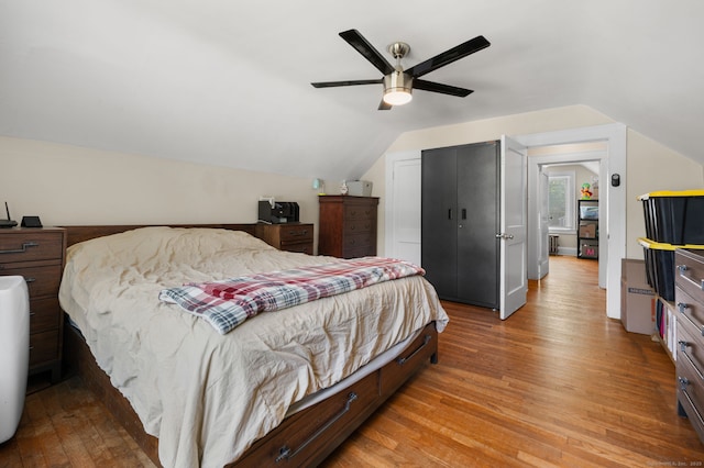 89 Geer Ave, Norwich, CT 06360 - bedroom with light wood-type flooring, vaulted ceiling, a closet, and a ceiling fan