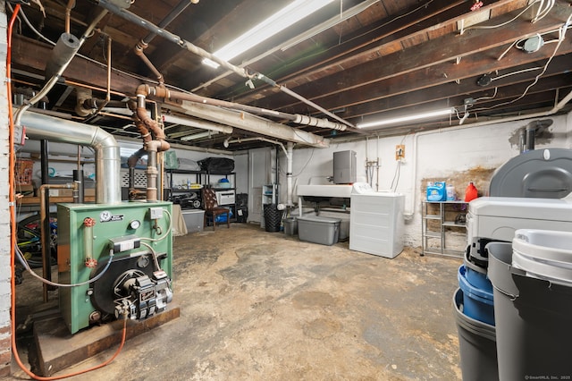 89 Geer Ave, Norwich, CT 06360 - unfinished below grade area featuring heating fuel, washing machine and dryer, and a heating unit