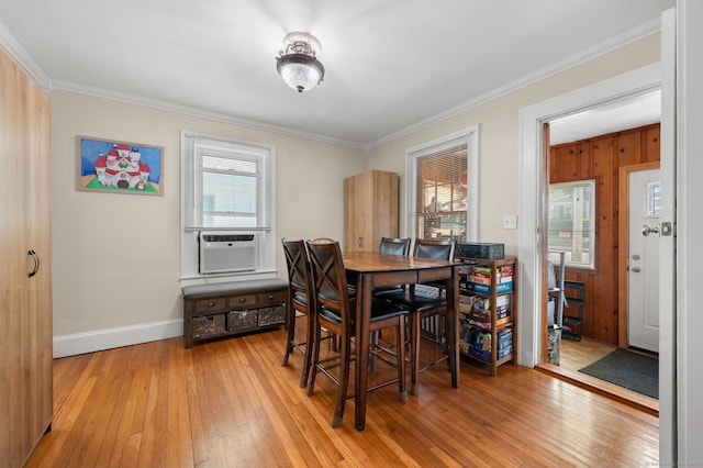 89 Geer Ave, Norwich, CT 06360 - dining area with ornamental molding, light wood finished floors, and cooling unit