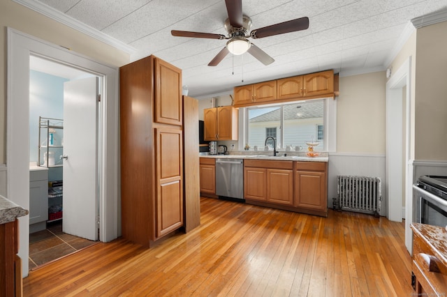 89 Geer Ave, Norwich, CT 06360 - kitchen featuring radiator, stainless steel dishwasher, light wood finished floors, light countertops, and a ceiling fan
