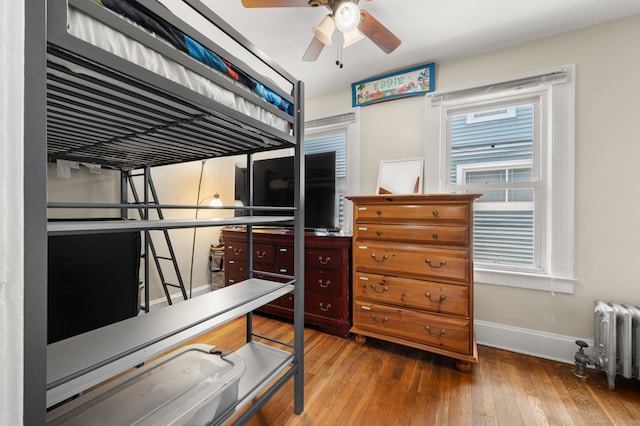 89 Geer Ave, Norwich, CT 06360 - bedroom featuring hardwood / wood-style flooring and radiator