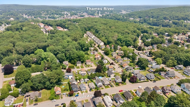 89 Geer Ave, Norwich, CT 06360 - aerial view of property and surrounding area with a heavily wooded area and nearby suburban area