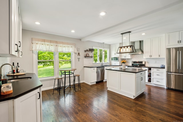 28 Saddle Ridge Dr, Simsbury, CT 06092 - kitchen with appliances with stainless steel finishes, wall chimney exhaust hood, dark countertops, open shelves, and backsplash