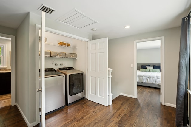 28 Saddle Ridge Dr, Simsbury, CT 06092 - laundry room featuring washer and clothes dryer, dark wood-style flooring, and recessed lighting