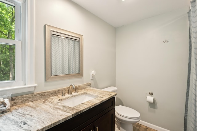 28 Saddle Ridge Dr, Simsbury, CT 06092 - bathroom featuring healthy amount of natural light, vanity, and wood finished floors