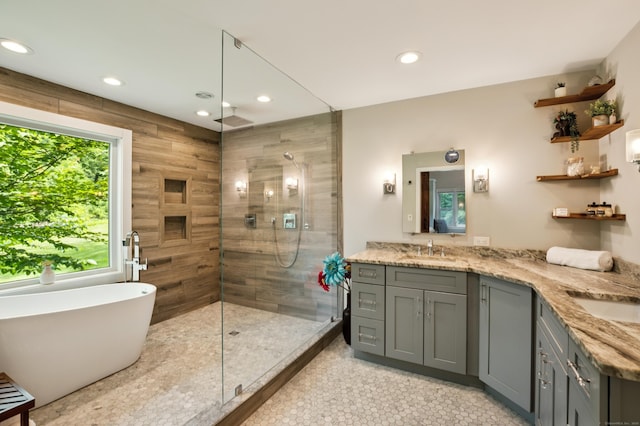28 Saddle Ridge Dr, Simsbury, CT 06092 - full bath with a tile shower, double vanity, recessed lighting, a freestanding bath, and tile patterned floors