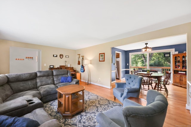 39 Alder Rd, Simsbury, CT 06070 - living room featuring light wood-style flooring and baseboards