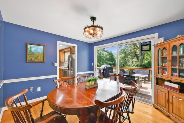39 Alder Rd, Simsbury, CT 06070 - dining area featuring a chandelier and light wood-style flooring