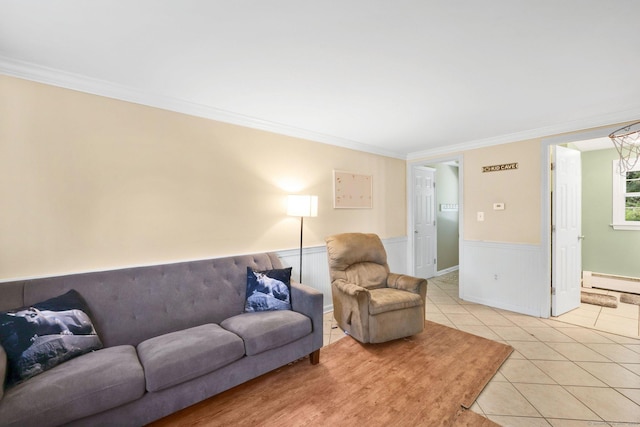 39 Alder Rd, Simsbury, CT 06070 - living area with light tile patterned floors, a baseboard heating unit, crown molding, and a wainscoted wall