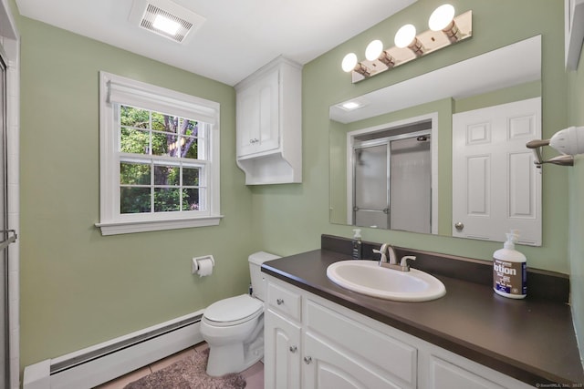 39 Alder Rd, Simsbury, CT 06070 - bathroom with a baseboard heating unit, a stall shower, vanity, and tile patterned flooring