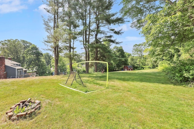 39 Alder Rd, Simsbury, CT 06070 - view of yard featuring a shed and view of scattered trees