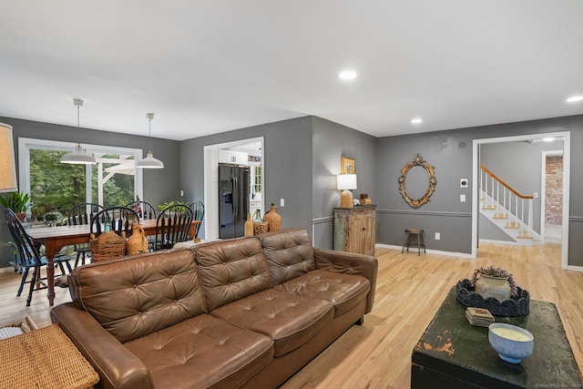 17 Mail Coach Dr, Norwalk, CT 06850 - living room with light wood-style floors, stairs, and recessed lighting