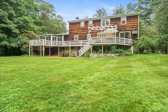 17 Mail Coach Dr, Norwalk, CT 06850 - back of house with a deck, a sunroom, a yard, and stairs