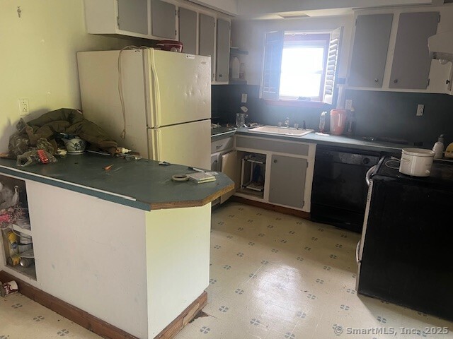 51 N Cliff St, Norwich, CT 06360 - kitchen featuring freestanding refrigerator, light floors, dishwasher, wall chimney range hood, and stove