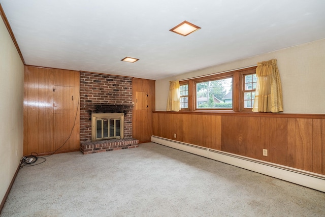 62 Eddy Ln, Newington, CT 06111 - unfurnished living room featuring a baseboard radiator, wood walls, a brick fireplace, and carpet flooring
