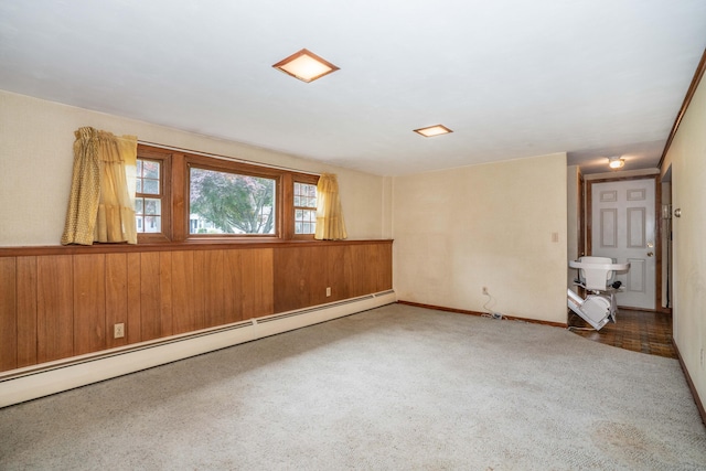 62 Eddy Ln, Newington, CT 06111 - carpeted empty room featuring a baseboard heating unit