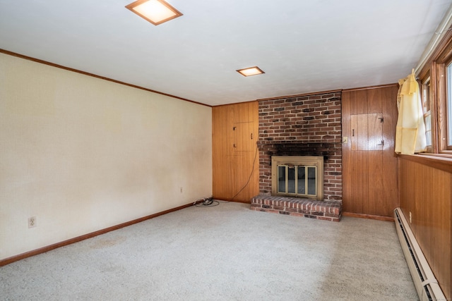 62 Eddy Ln, Newington, CT 06111 - unfurnished living room featuring a baseboard heating unit, a fireplace, carpet floors, wooden walls, and ornamental molding