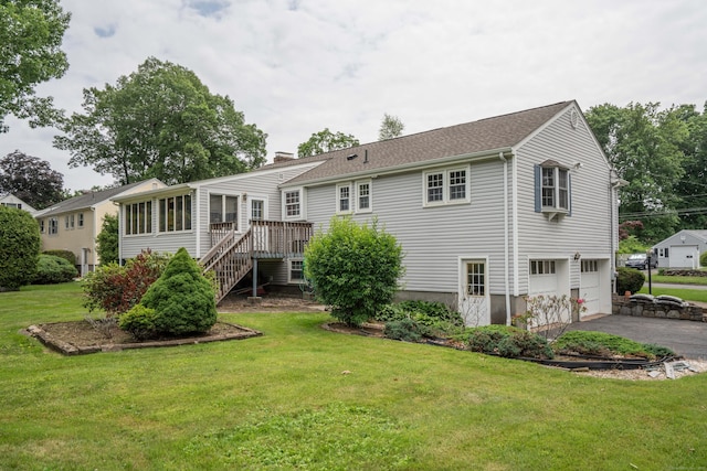 62 Eddy Ln, Newington, CT 06111 - rear view of property with asphalt driveway, an attached garage, stairway, a yard, and a chimney