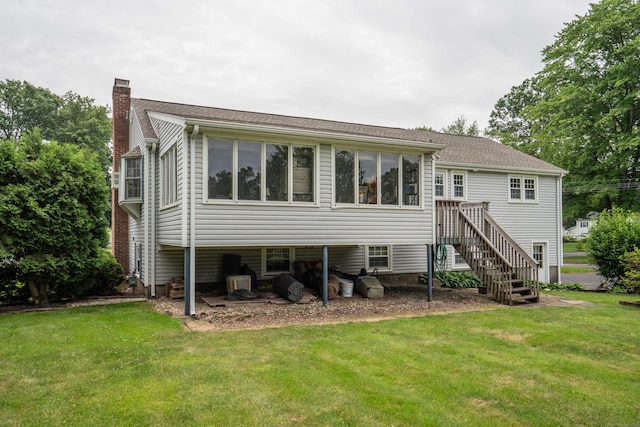 62 Eddy Ln, Newington, CT 06111 - rear view of property with a chimney and a lawn