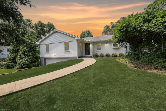 3743 Park Ave, Fairfield, CT 06825 - ranch-style house with a yard, a garage, and brick siding