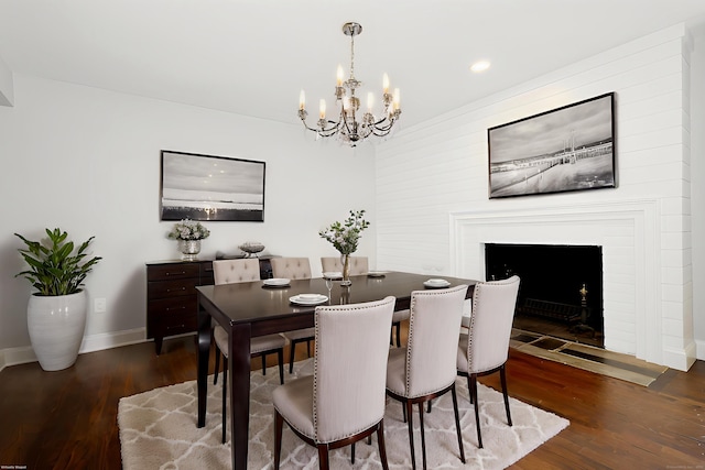 3743 Park Ave, Fairfield, CT 06825 - dining room featuring a chandelier, dark wood-style floors, recessed lighting, and a fireplace