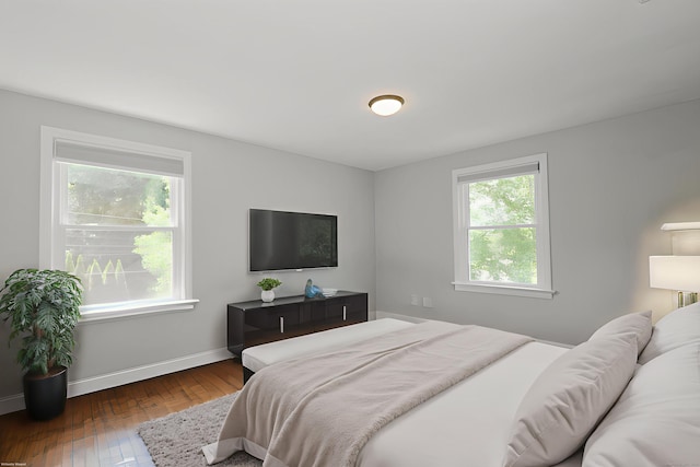 3743 Park Ave, Fairfield, CT 06825 - bedroom featuring multiple windows and wood-type flooring