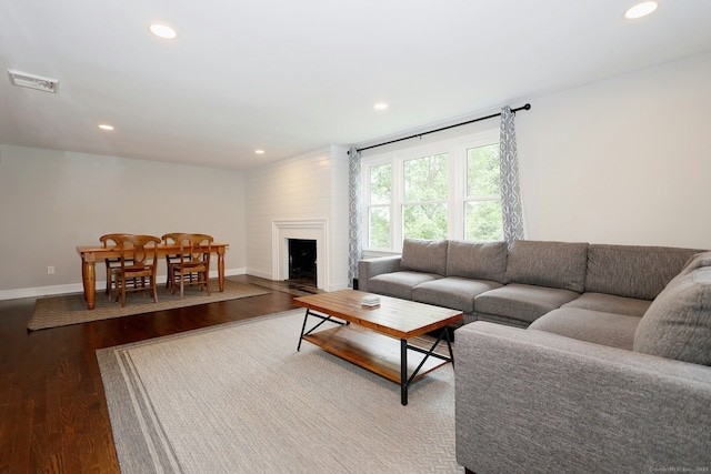 3743 Park Ave, Fairfield, CT 06825 - living area with dark wood-style floors, recessed lighting, and a fireplace