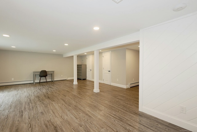 3743 Park Ave, Fairfield, CT 06825 - finished below grade area featuring baseboard heating, wood finished floors, and recessed lighting