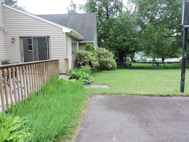 14 Cartier Rd, Enfield, CT 06082 - view of grassy yard featuring a patio