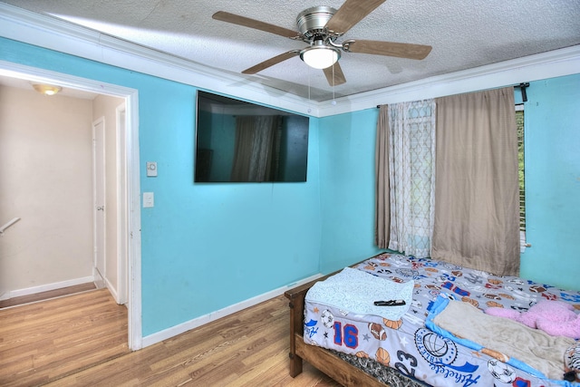 121 Lexington Ave Unit 21, New Haven, CT 06513 - bedroom featuring wood finished floors, a textured ceiling, and a ceiling fan