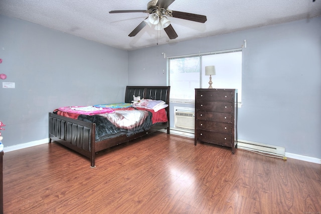 121 Lexington Ave Unit 21, New Haven, CT 06513 - bedroom with a baseboard radiator, wood finished floors, a textured ceiling, ceiling fan, and a wall mounted air conditioner