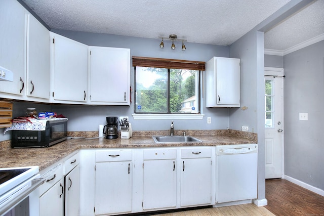 121 Lexington Ave Unit 21, New Haven, CT 06513 - kitchen featuring white appliances, light wood-type flooring, white cabinetry, a textured ceiling, and healthy amount of natural light