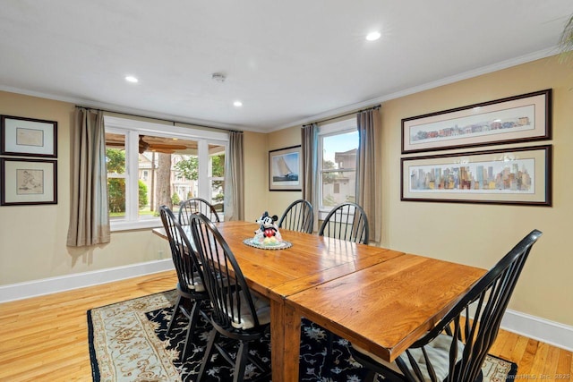 160 Disbrow St, Stratford, CT 06614 - dining room with crown molding, recessed lighting, healthy amount of natural light, and light wood-style floors